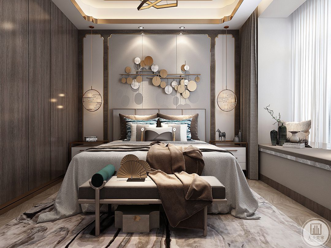次卧室整体风格更加现代，床头背景墙采用圆形金属装饰现代感强烈。