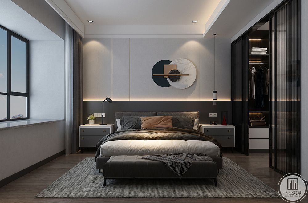 卧室由浅入深的灰色搭配营造出丰富的层次，简单的夯实灯光带一圈弧度，让素色的空间不觉得单调。
