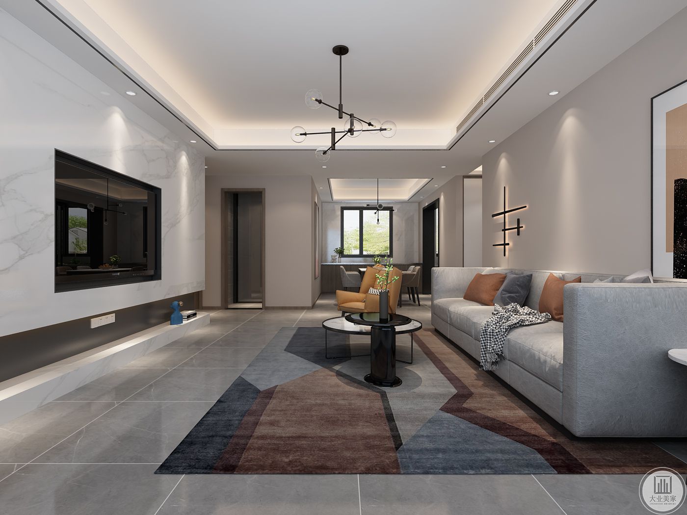 冷灰色沙发搭配暖色墙面，几何拼花地毯做衬，整体温馨舒适，又凸显个性